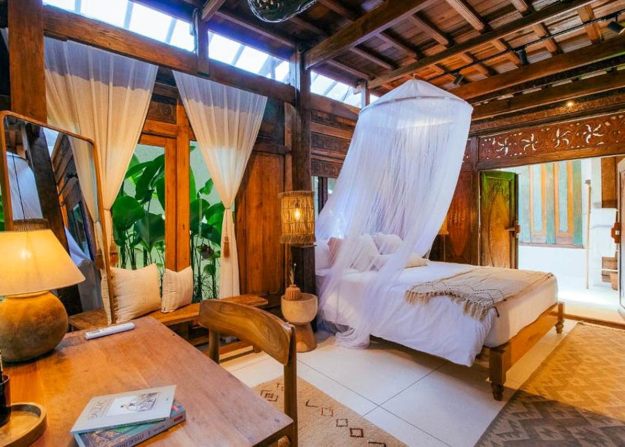 Bedroom at Villa Yin with timber ceiling and desk