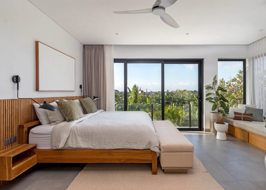 Bedroom with glass sliding doors installed at villa in Seminyak