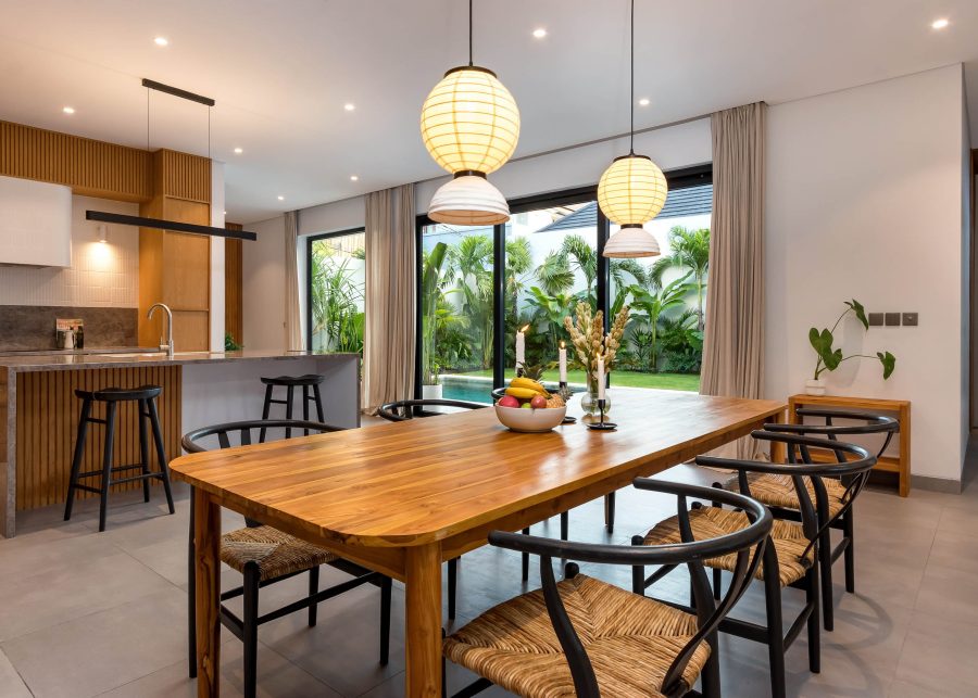 Dining area at Villa Quadra with designer lighting