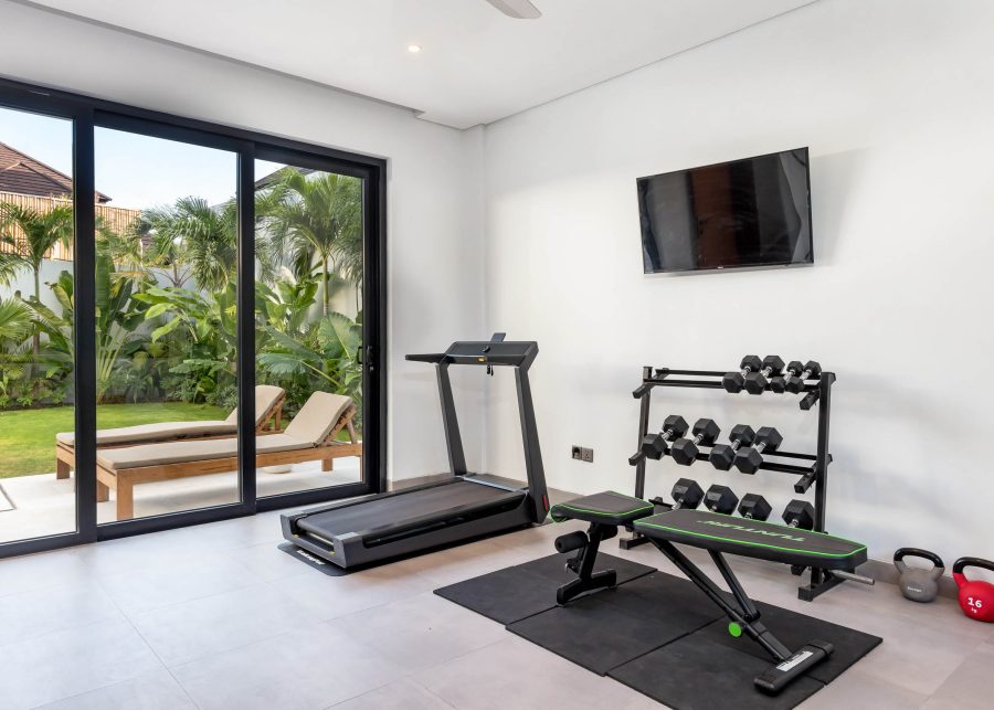 Gym room overlooking garden area at Villa Quadra