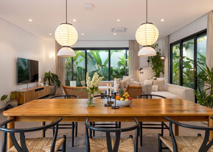 Large dining table in open plan living room