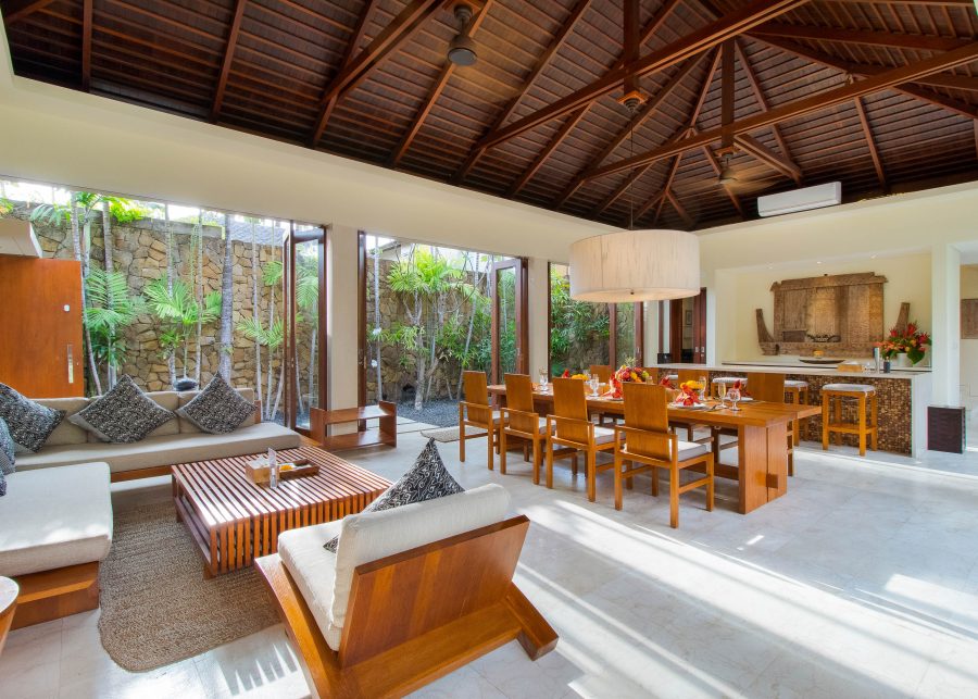 Living area at Villa Josuloma with wooden constructed ceiling and modern Balinese design