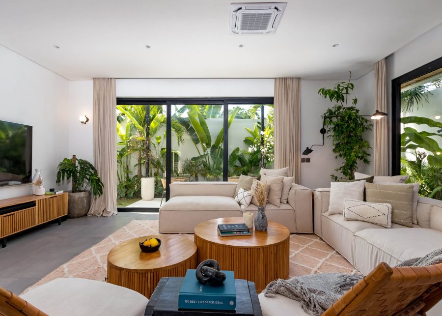 Lounge area at Villa Quadra in Seminyak with teak furnishings