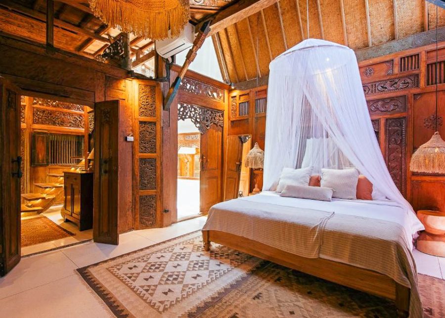 Timber walled bedroom at Villa Yin in Bali