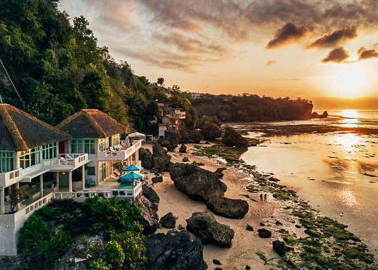 View of Mandala The Rocks villa at sunset