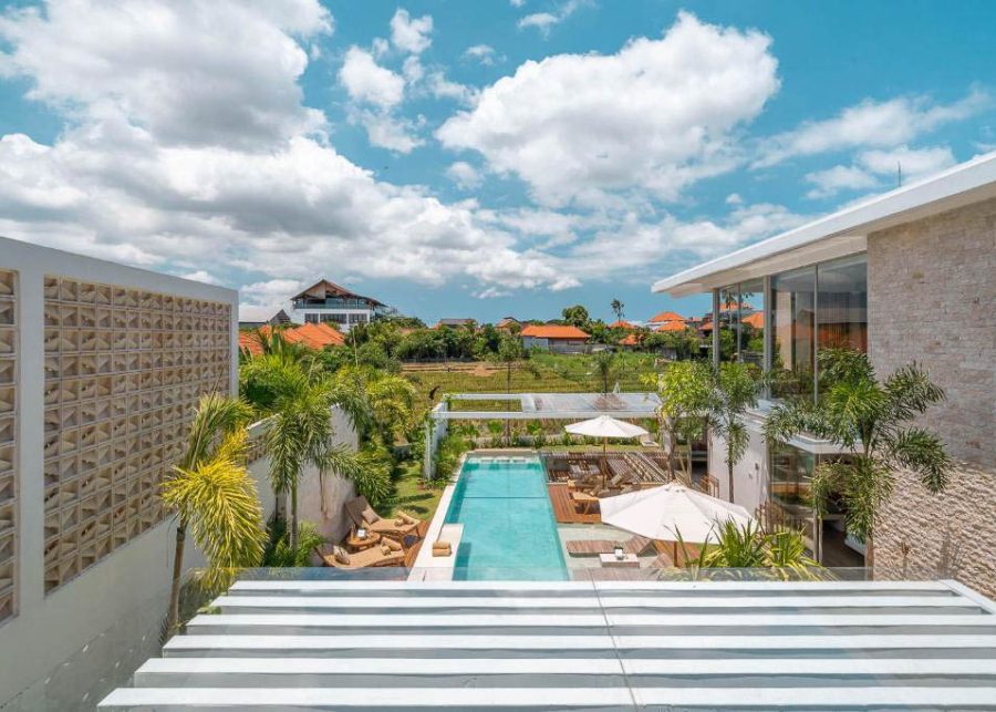 View of Villa Vida's from upstairs showing Marmo stone cladding and 20 metre swimming pool