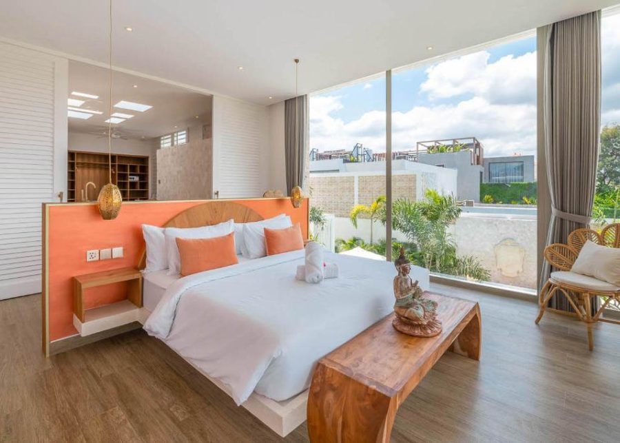 Villa Vida bedroom with floor to ceiling glass windows